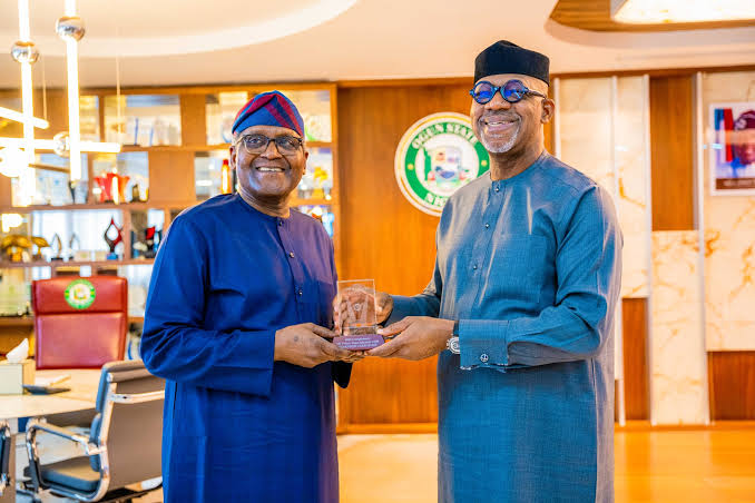 Picture showing Mr Aliko Dangote and Ogun state governor Dapo Abiodun